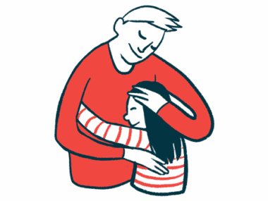 An adult and a child wrap their arms around each other in an embrace.
