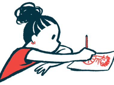A little girl is seen drawing a picture while sitting at a table.