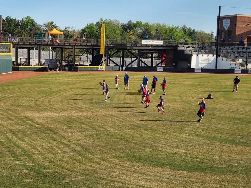 Epidermolysis Bullosa News | A long-distance photo of Jonah's brother's baseball team playing catch on the Winston-Salem Dash baseball team's outfield in North Carolina