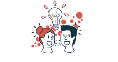 A giant light bulb is seen popping up between the heads of two people.